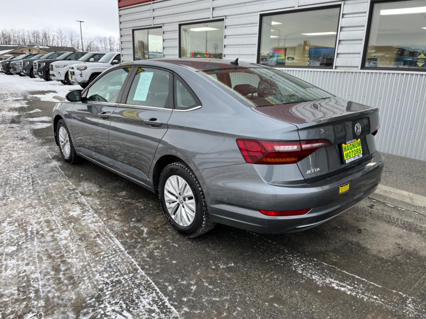 2019 Gray /Black Volkswagen Jetta 1.4T SE 8A (3VWC57BU8KM) with an 1.4L L4 DOHC 20V engine, 8A transmission, located at 1960 Industrial Drive, Wasilla, 99654, (907) 274-2277, 61.573475, -149.400146 - Photo#3